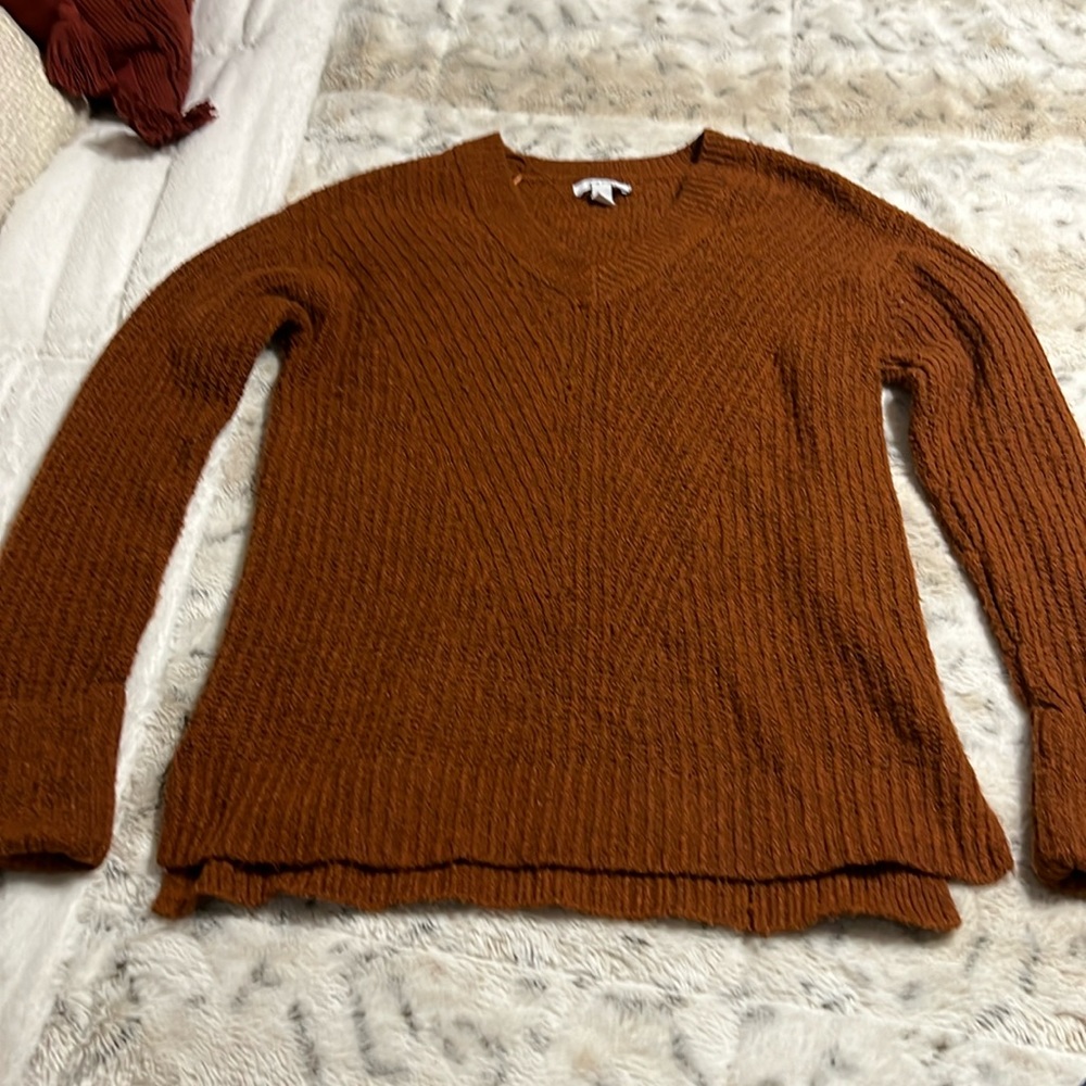 Rust colored sweater by the brand nine West. size small